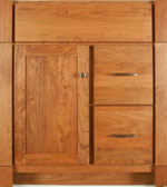 Molding Overlay Construction with Shaker Door style in Cherry-Golden Wood-Color. Standard Monterey Decorative Hardware shown.